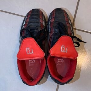 Black and red soccer cleats
